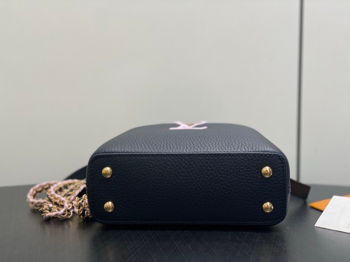 Black Braided Chain Top Handle Bag back view with smooth leather texture and braided chain detail