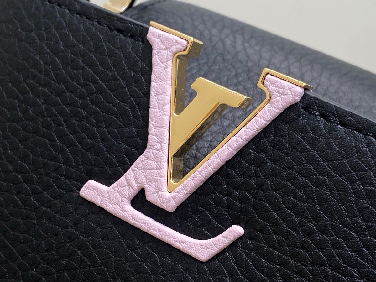 Black Braided Chain Top Handle Bag detail view with smooth leather texture and braided chain detail