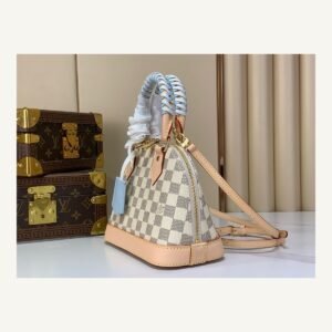 Blue Check Woven Top Handle Bag angle view with woven handle and checked texture on neutral thumbnail background