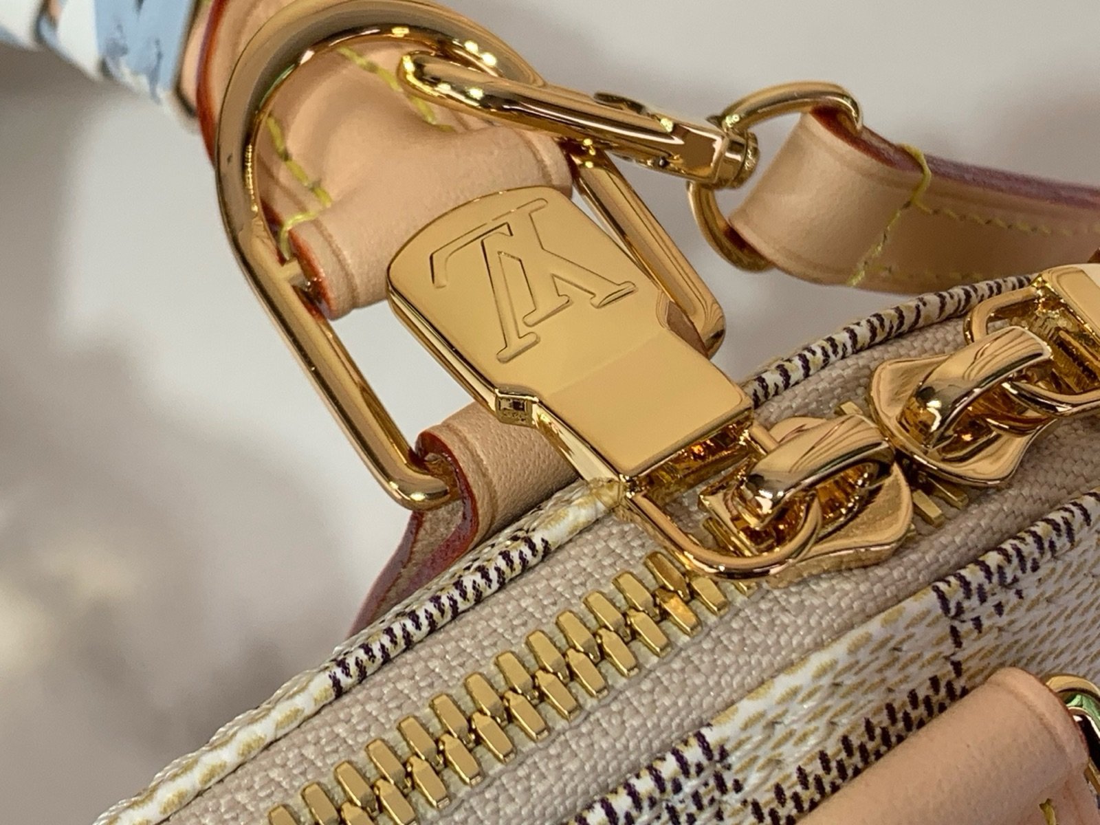Blue Check Woven Top Handle Bag hardware detail view with woven handle and checked texture