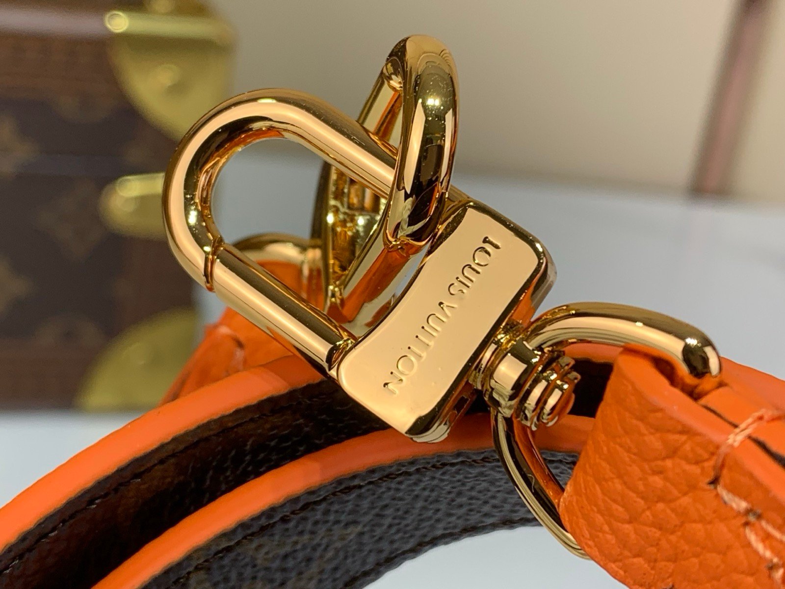 Brown Orange Reversible Mini Tote Bag hardware detail view with reversible patterned canvas and grained texture