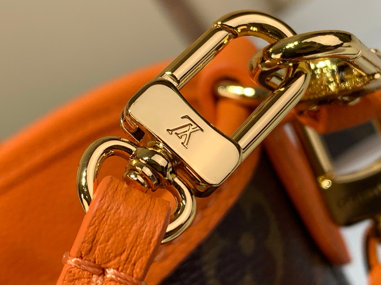 Brown Orange Reversible Mini Tote Bag strap detail view with reversible patterned canvas and grained texture