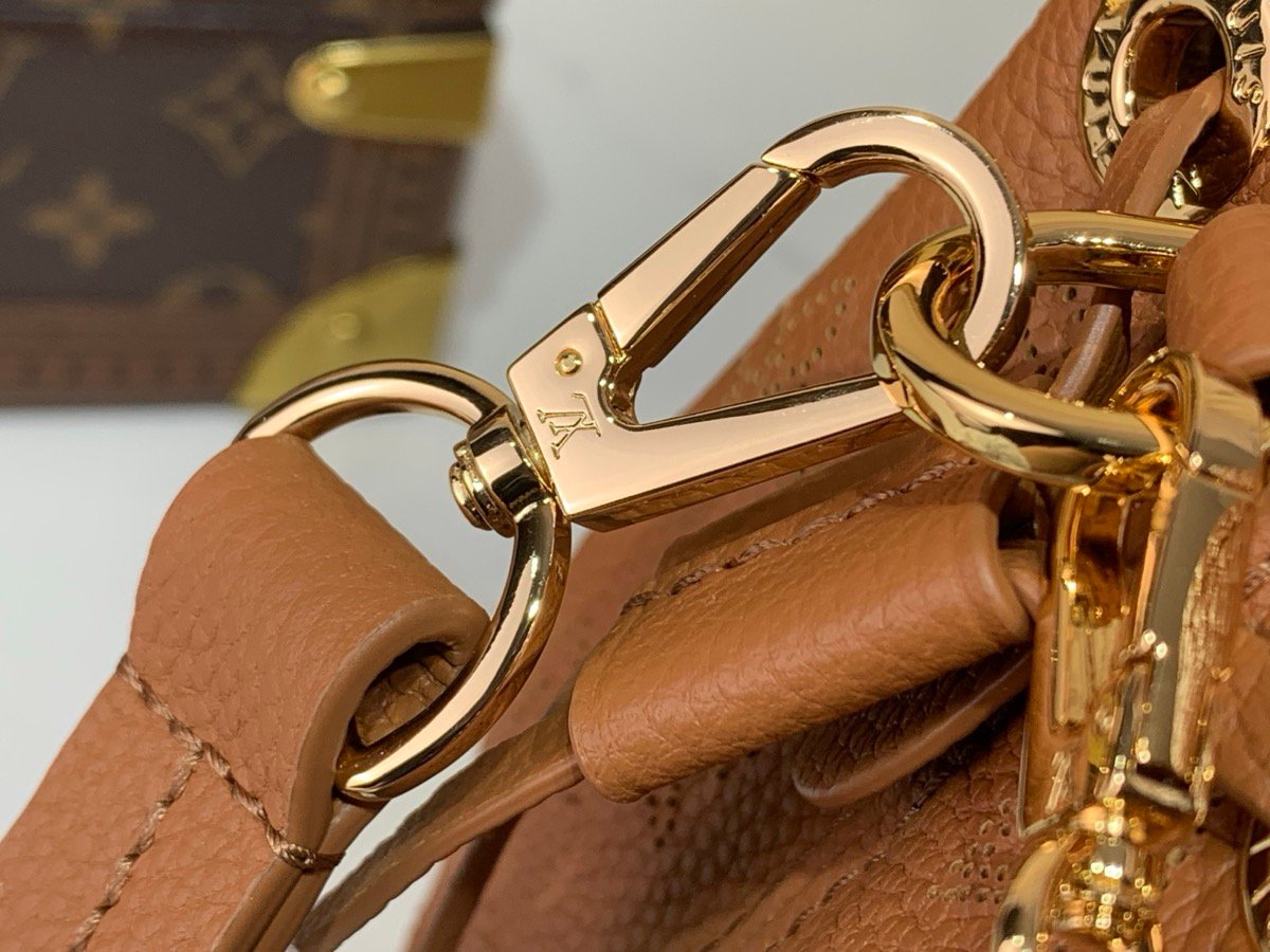 Brown Perforated Soft Tote Bag hardware detail view with perforated leather texture and chain detail