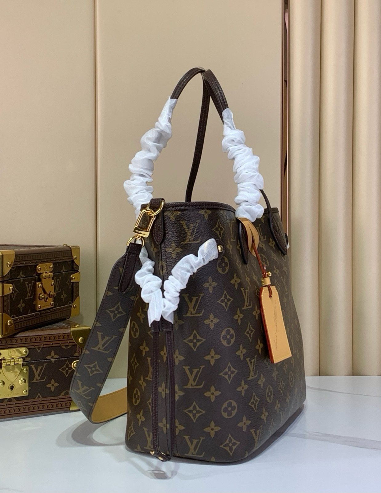 Brown Reversible Medium Tote Bag angle view with reversible styling and embossed texture