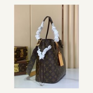 Brown Reversible Medium Tote Bag angle view with reversible styling and embossed texture on neutral thumbnail background
