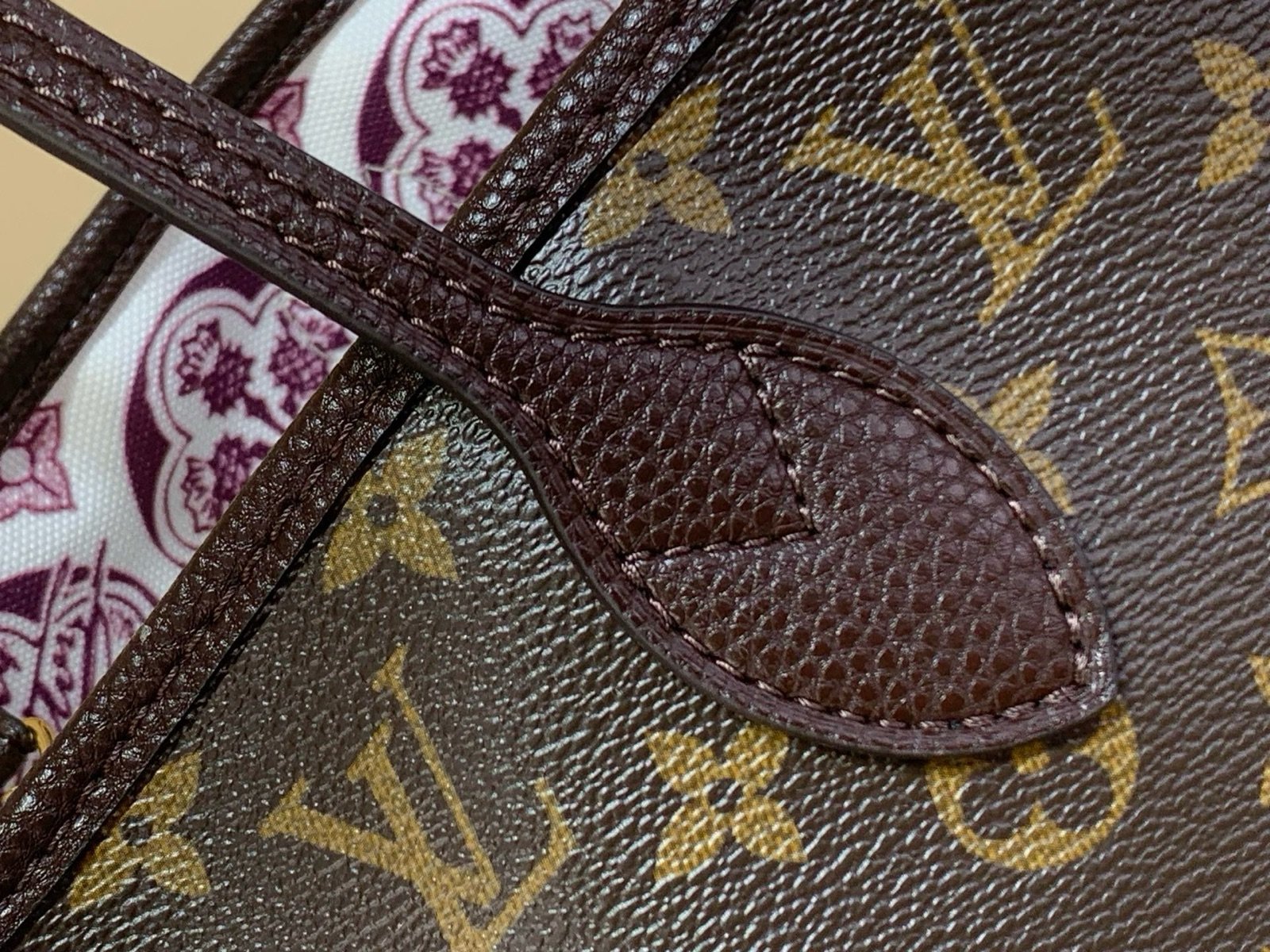 Brown Reversible Medium Tote Bag detail view with reversible styling and embossed texture