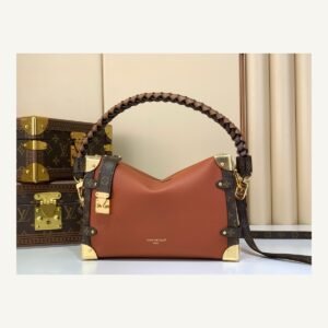 Brown Woven Medium Trunk Bag angle view with woven strap and gold tone hardware on neutral thumbnail background