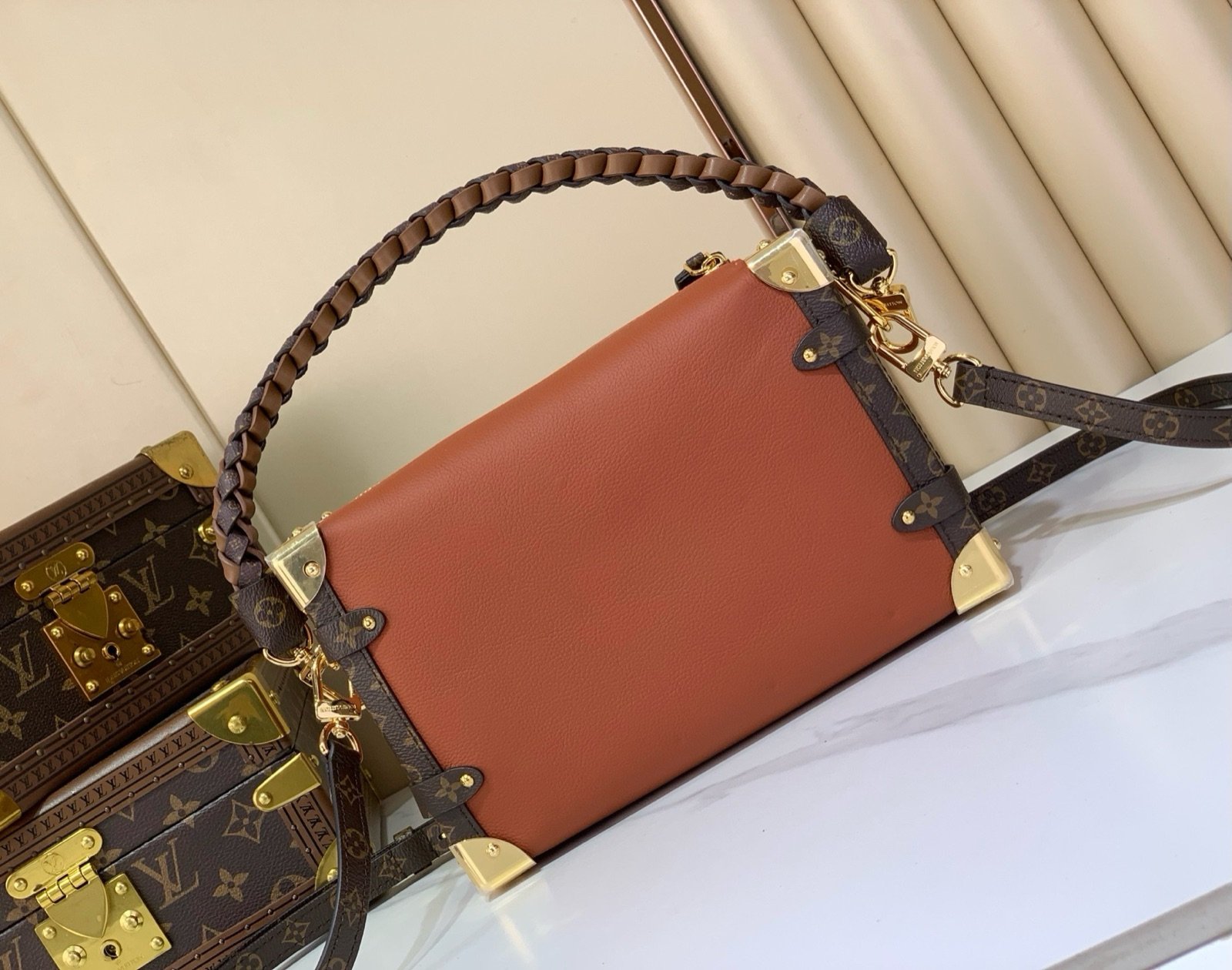 Brown Woven Medium Trunk Bag back view with woven strap and gold tone hardware