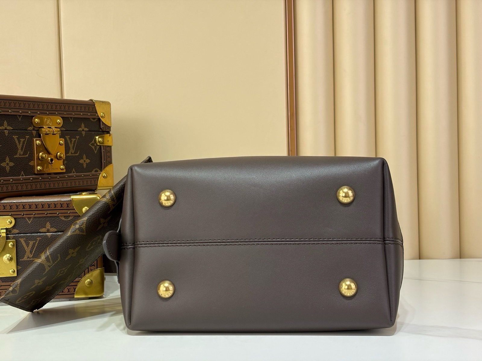 Cream Brown Hobo Shoulder Bag back view with smooth two tone leather texture with a soft shoulder strap