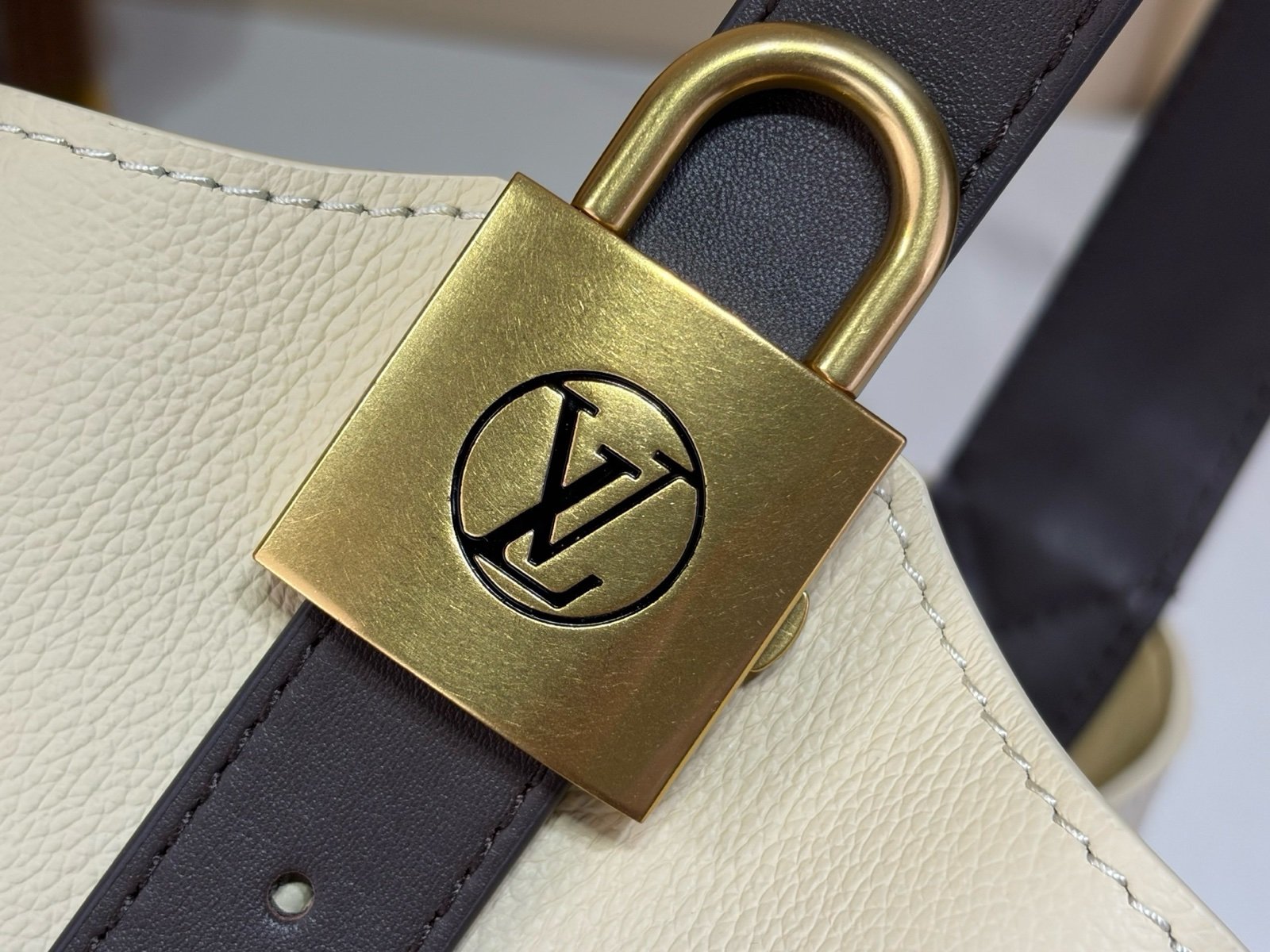 Cream Brown Hobo Shoulder Bag detail view with smooth two tone leather texture with a soft shoulder strap