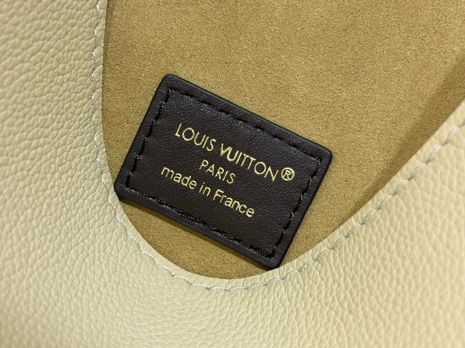Cream Brown Hobo Shoulder Bag interior view with smooth two tone leather texture with a soft shoulder strap