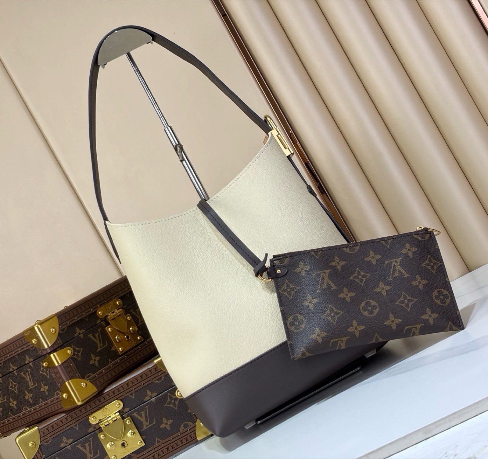 Cream Brown Hobo Shoulder Bag side view with smooth two tone leather texture with a soft shoulder strap