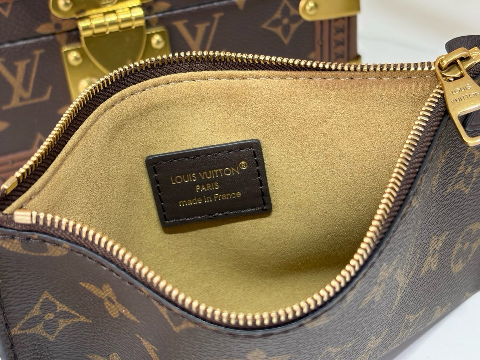 Cream Brown Hobo Shoulder Bag strap detail view with smooth two tone leather texture with a soft shoulder strap