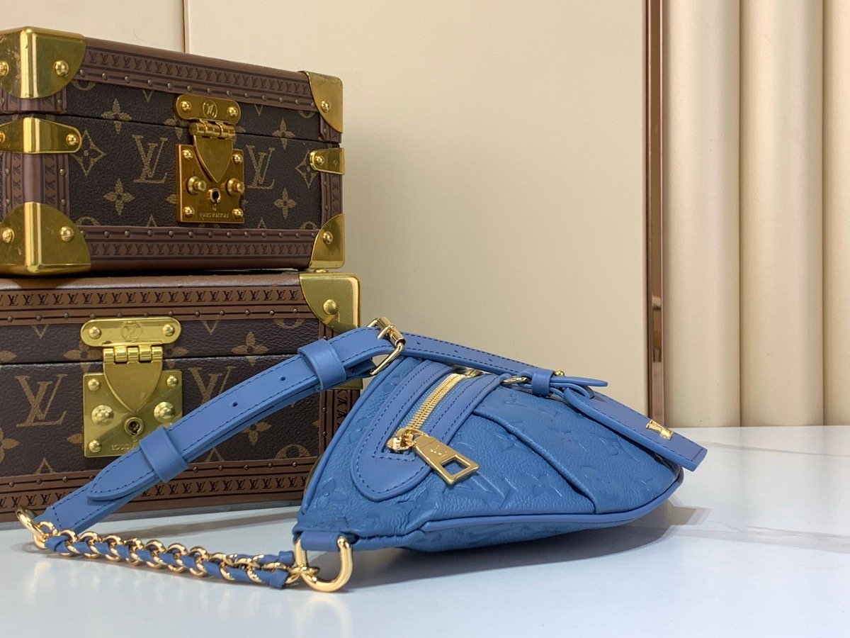 Mist Blue Belt Bag angle view with grained texture and polished hardware