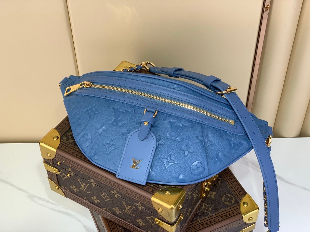 Mist Blue Belt Bag side view with grained texture and polished hardware