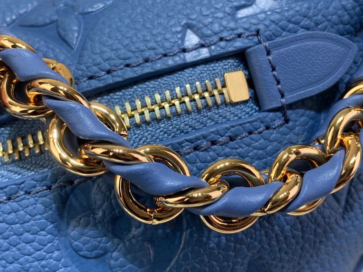 Mist Blue Belt Bag strap detail view with grained texture and polished hardware