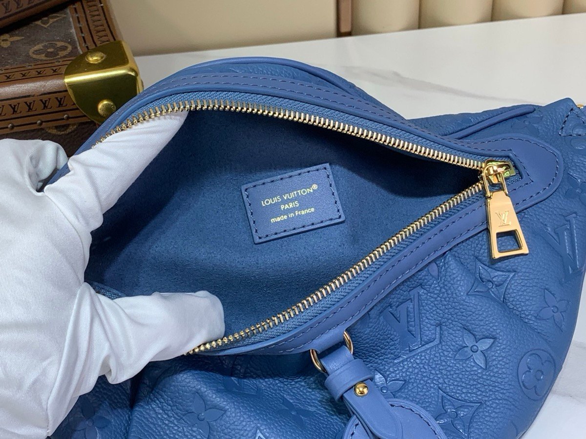 Mist Blue Belt Bag styling view with grained texture and polished hardware