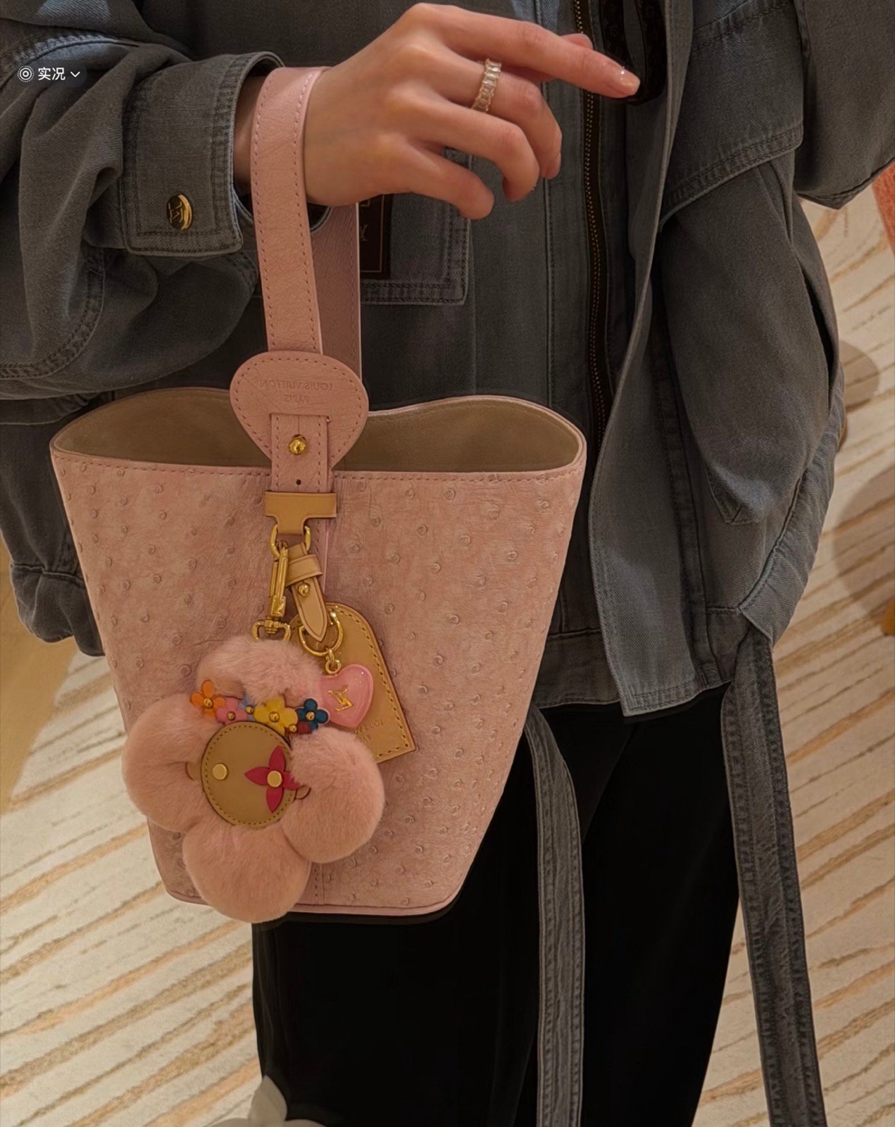 Pink Ostrich Texture Bucket Bag interior view with ostrich texture and smooth trim