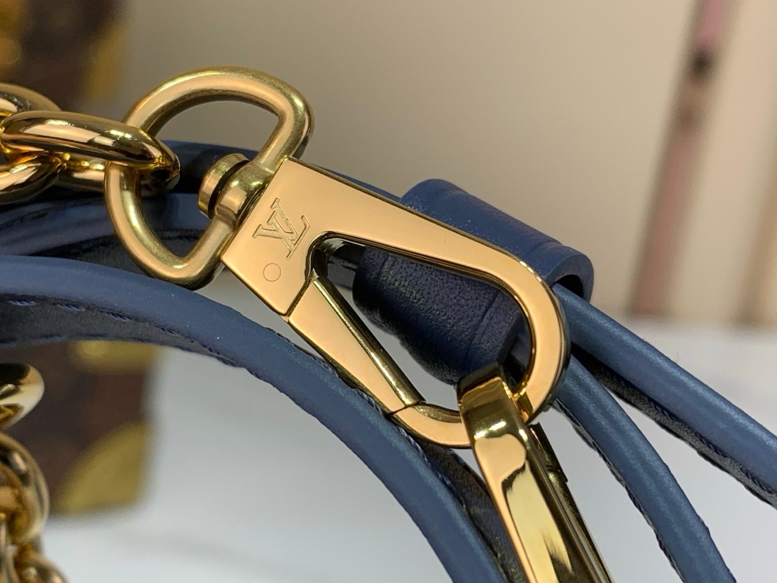 Royal Blue Embossed Compact Boston Bag hardware detail view with embossed texture and silver tone hardware