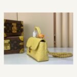 Yellow And Purple Nano Top Handle Bag angle view with smooth color finish and compact handle on neutral thumbnail background