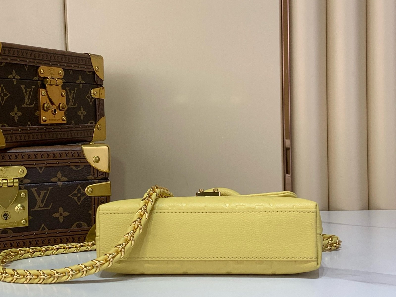 Yellow And Purple Nano Top Handle Bag back view with smooth color finish and compact handle