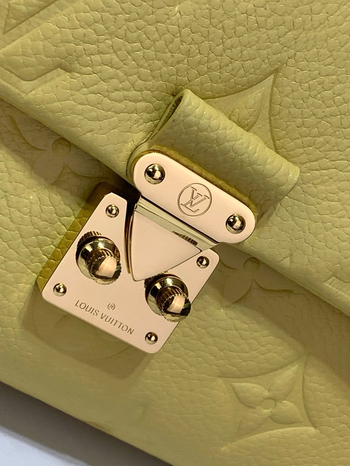 Yellow And Purple Nano Top Handle Bag detail view with smooth color finish and compact handle